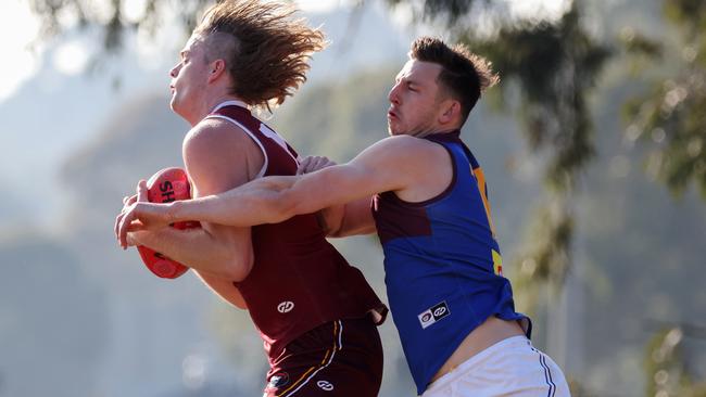 Ciaran Porter marks in front of Jack Langford. Picture: George Salpigtidis