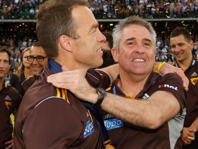 Alastair Clarkson, Senior Coach of the Hawks (left) and Chris Fagan celebrate during the 2014 Toyota AFL Grand Final match between the Sydney Swans and the Hawthorn Hawks at the MCG, Melbourne on September 27, 2014. (Photo: Michael Willson/AFL Media)