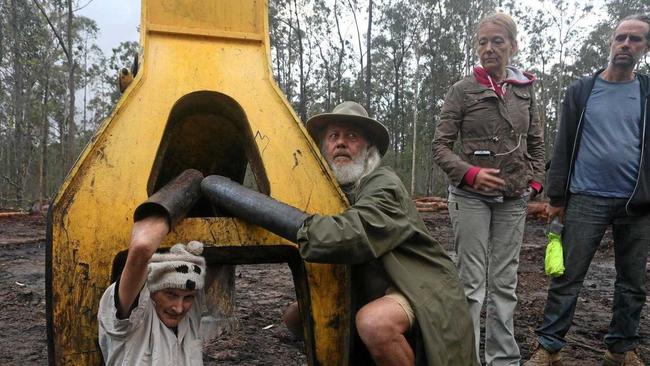 LOCKED ON: Alan Roberts (left) from the Nimbin Environment Centre and Dailin Pugh, (righ ) are some of the Northern Rivers protesters at Gibberagee State Forest near Whiporie. Picture: Jimmy Malecki