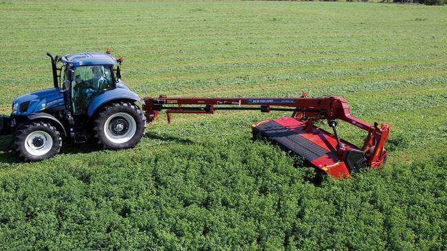 On a roll: High-quality export hay is not securely stacked in sheds yet and the wetter than average forecast is worrying growers.