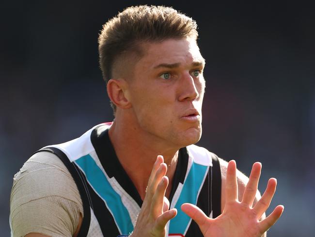 MELBOURNE, AUSTRALIA – APRIL 20: Jordon Sweet of the Power marks during the round six AFL match between Collingwood Magpies and Port Adelaide Power at Melbourne Cricket Ground, on April 20, 2024, in Melbourne, Australia. (Photo by Quinn Rooney/Getty Images)