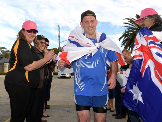 Isak Ketsakitis is greeted by family and friends at the Fairfield Assyrian Church. Pictures: Simon Bullard