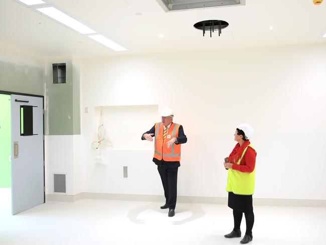 Minister for Health Brad Hazzard and Deborah Latta project director at Healthscope pictured in an operating theatre at the Northern Beaches Hospital site. Medical equipment will arrive early 2018. Picture: Damian Shaw