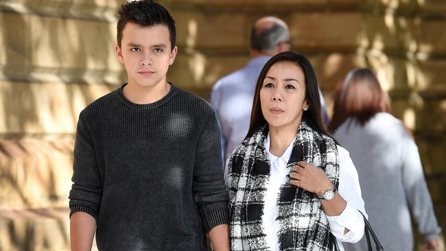 Keanu Dallas, left, and his mother, Veny Amelia, outside the Supreme Court. Picture: Roger Wyman.