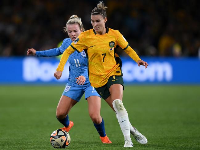 Steph Catley (right) is confident the Matildas will qualify for the Olympics. Picture: Justin Setterfield/Getty Images