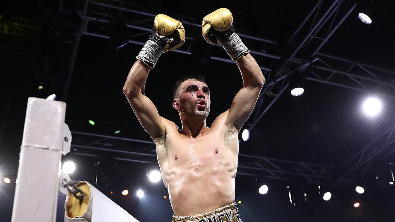 MELBOURNE, AUSTRALIA - OCTOBER 16: Jason Moloney celebrates victory over Nawaphon Kaikanha in the undercard fight before the World Lightweight Championship bout between George Kambosos Jr. of Australia and Devin Haney of the United States at Rod Laver Arena on October 16, 2022 in Melbourne, Australia. (Photo by Kelly Defina/Getty Images)