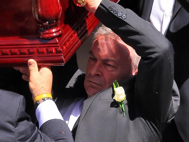 Borce Ristevski carries his wife’s casket at her funeral. Picture: Aaron Francis/The Australian