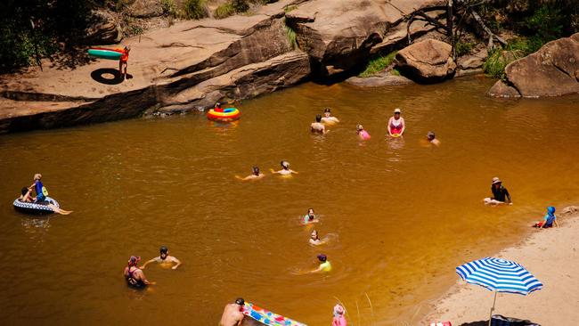 The swimming hole is a popular spot for children on hot days. Picture: Jonathan Ng