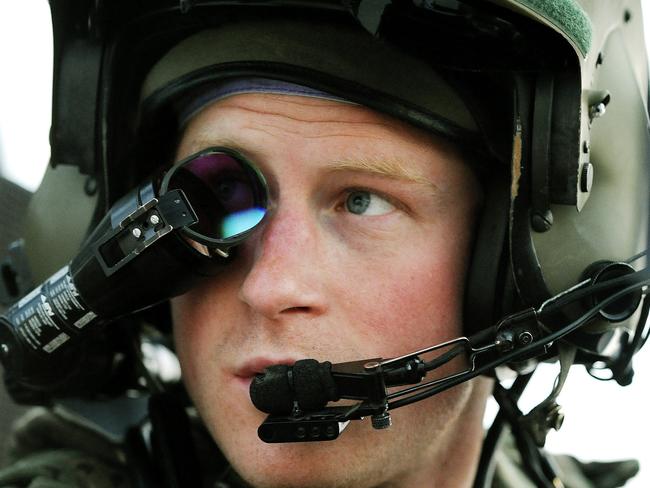 Prince Harry wearing his monocle gun sight as he sits in the front seat of his Apache Helicopter at the British controlled flight-line at Camp Bastion in Afghanistan's Helmand Province. Picture: AFP