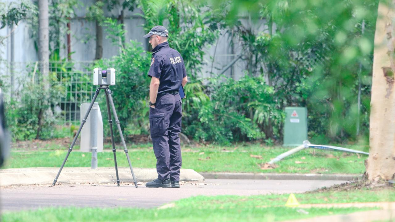 NT police investigate as a males body was found in a driveway in Driver on Saturday morning. Picture: Glenn Campbell