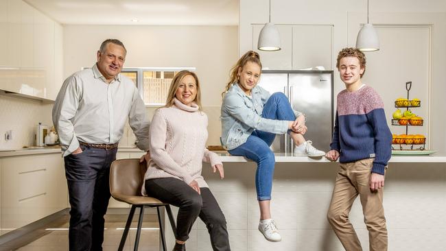 Linda and Rohan Robertson with children Max, 15, and Isabella, 13, who will not return to school until at least October 26. Picture: Tim Carrafa