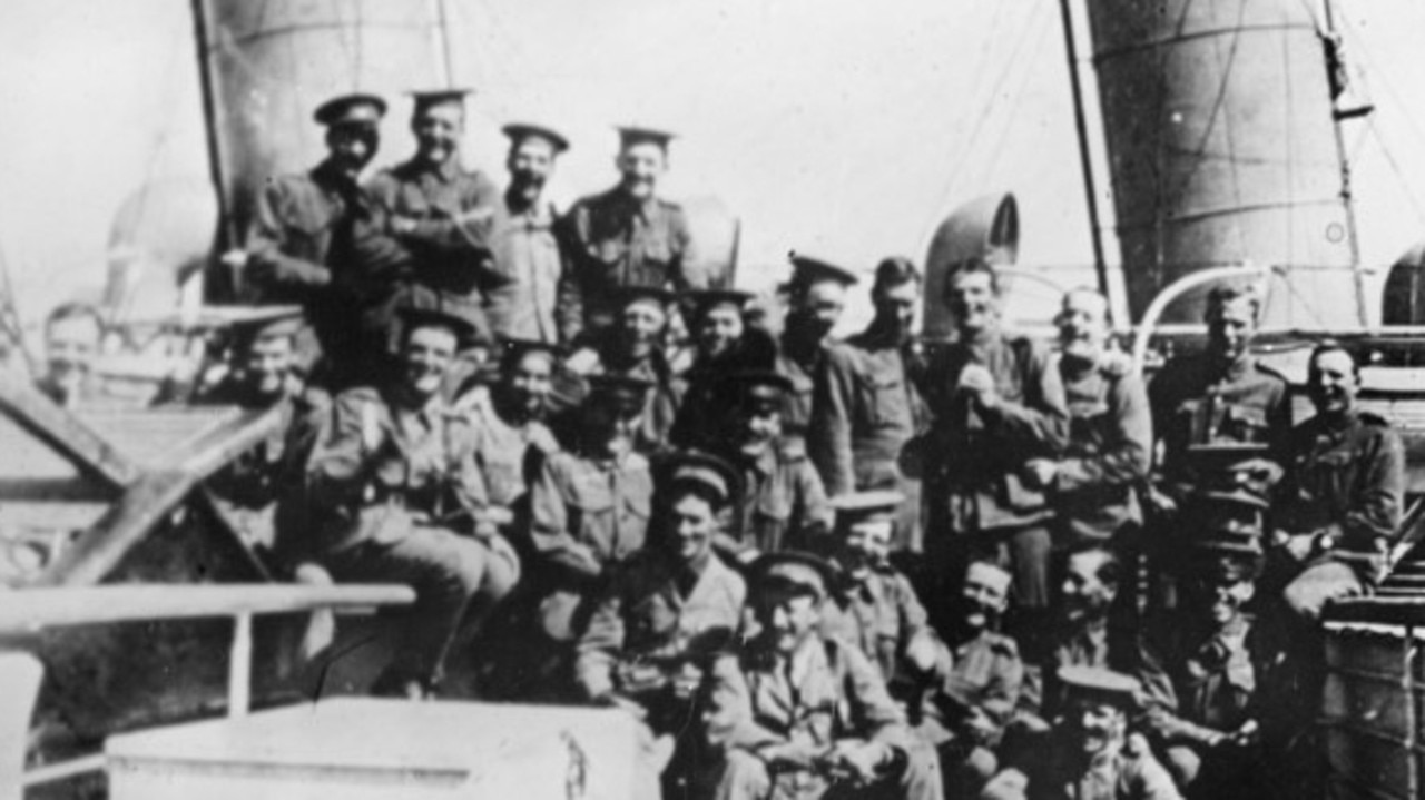 Cheerful officers and soldiers of the 9th Battalion aboard HMAS Omrah (A5). Image sourced from the Australian War Memorial.