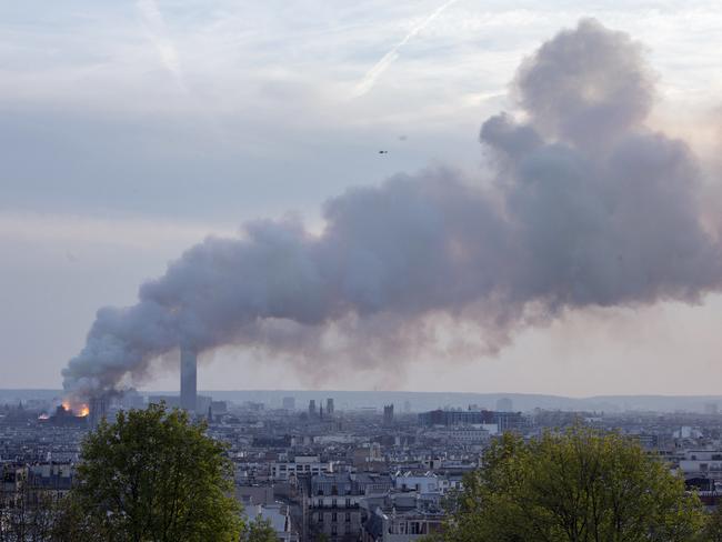 Notre Dame cathedral is burning in Paris, Monday, April 15, 2019. (AP Photo/Rafael Yaghobzadeh)