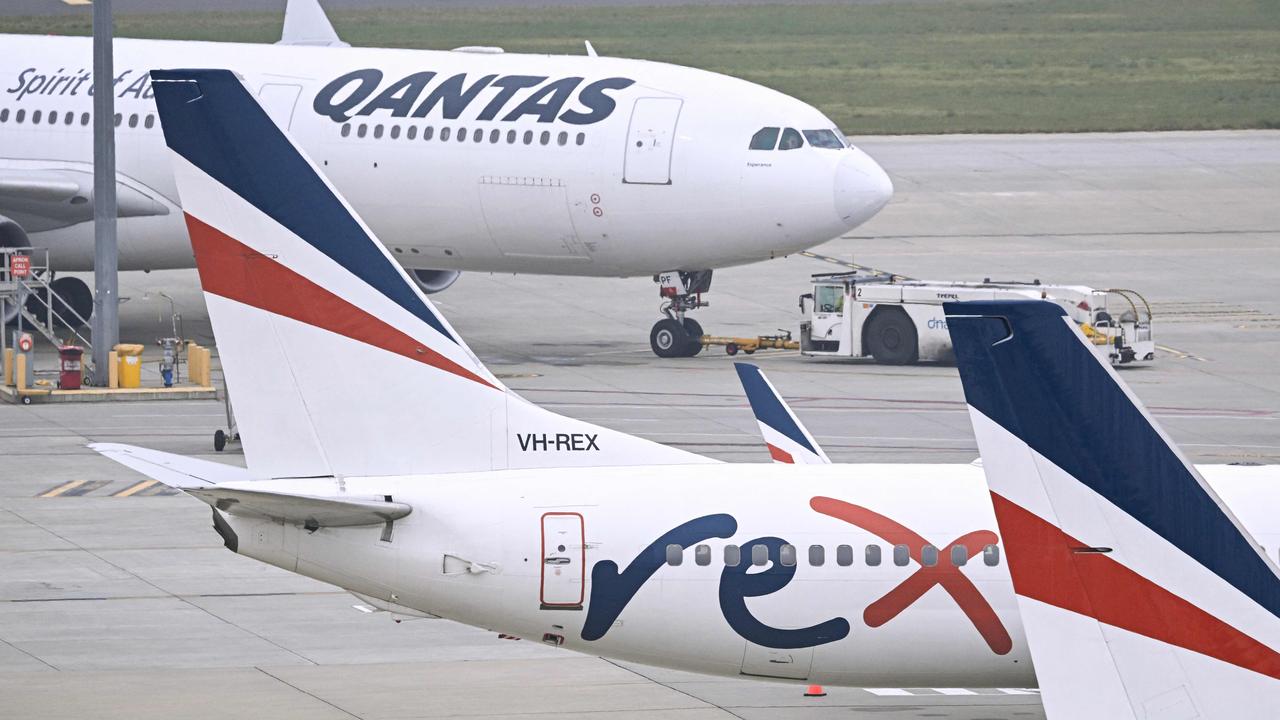 The Australian regional airline Rex cancelled flights as it entered voluntary administration on July 31, leaving the fate of the country's third-largest carrier in serious doubt. Picture: William WEST / AFP