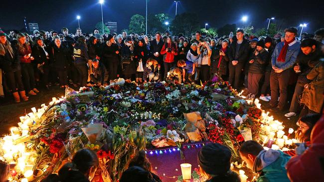 Mourners pay their respects during a vigil held in memory of Eurydice Dixon, at Princess Park in June 2018. Picture: Michael Dodge/Getty Images