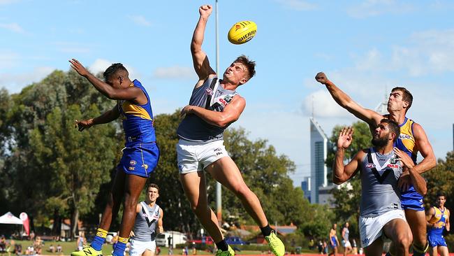 Ollie Wines spoils a Liam Ryan marking attempt. Picture: Getty Images