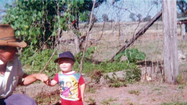 Natalie Hatton as a child in the garden of Darreen Station with her father Paul Hatton.