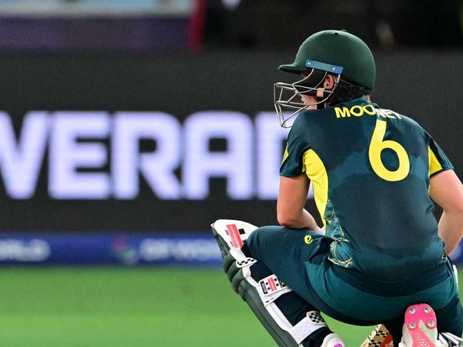 Australia's Beth Mooney reacts after her dismissal during the ICC Women's T20 World Cup cricket semi-final match between Australia and South Africa at the Dubai International Cricket Stadium in Dubai on October 17, 2024. (Photo by Giuseppe CACACE / AFP)