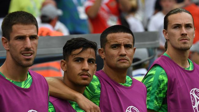 Daniel Arzani (centre left) alongside Socceroos legend Tim Cahill (centre right) at the 2018 World Cup. Picture: AAP