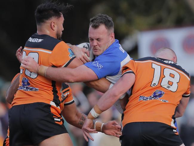 Nathaniel Peteru of Southport Tigers and Jack Glossop of Tugun Seahawks during the Grade A Gold Coast Rugby League grand final played at the UAA Park, Miami, Gold Coast, Sunday, September 10, 2023. Photo: Regi Varghese