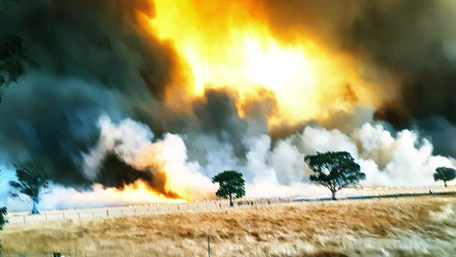 Supplied image of bushfire near the church in Cudgewa. Picture: Jason Turner