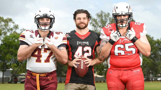 Townsville Cyclones players Ryan Worsley, Kyle Reynolds and Leon Suckling ahead of the 2024 Regional Queensland American football season. Worsley is pictured in his Regional Queensland Irukandji representative jersey. Picture: Shae Beplate.