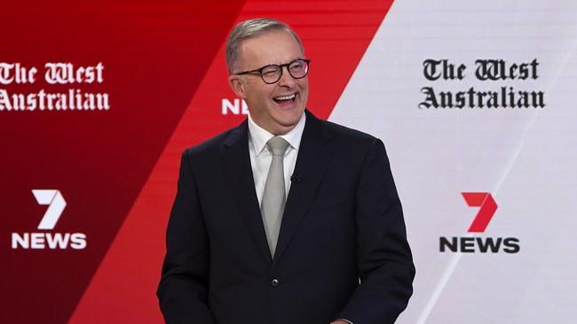 Opposition Leader Anthony Albanese reacts during the third leaders' debate at Seven Network Studios. (AAP Image/Lukas Coch)