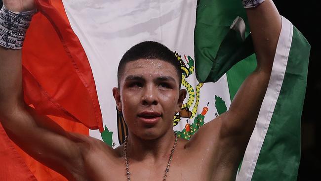 Jaime Munguia celebrates his victory over Takeshi Inoue for the WBO Junior Middleweight championship at Toyota Center on January 26, 2019 in Houston, Texas. Bob Levey/Getty Images/AFP 