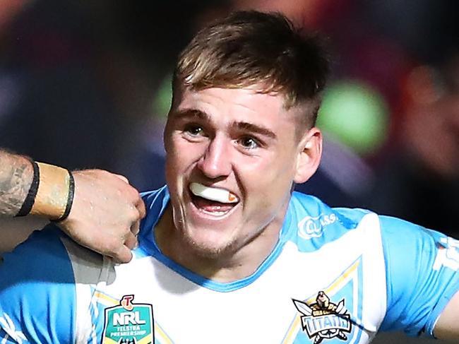 SYDNEY, AUSTRALIA - AUGUST 17: Kane Elgey and Alexander Brimson of the Titans celebrate Alexander Brimson scoring a try during the round 23 NRL match between the Manly Sea Eagles and the Gold Coast Titans at Lottoland on August 17, 2018 in Sydney, Australia. (Photo by Mark Kolbe/Getty Images)