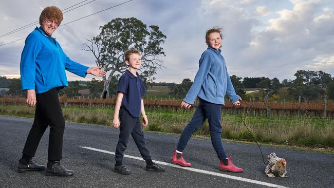 Wendy Nicholson with her grandkids, Theo, 7, and Lillian, 11, walking Bonnie. Picture: Matt Loxton