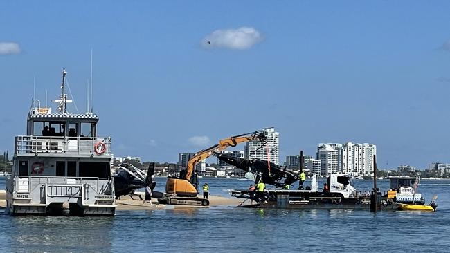 The wreckage being removed from the sandbar. Picture: Sam Stolz