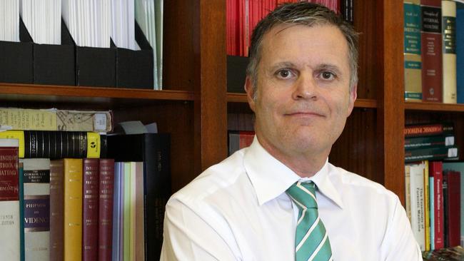 SA State Coroner Mark Johns, pictured in his office.