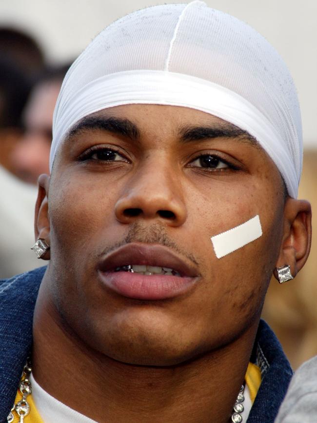 Nelly became known for wearing a plaster on his cheek. Picture: SGranitz/WireImage)