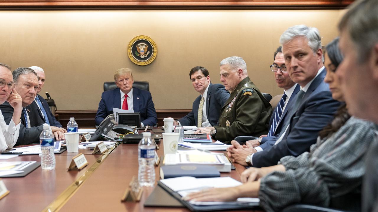 In this image released by the White House, Mr Trump, joined by Vice President Mike Pence, meets with senior White House advisers in the Situation Room. Picture: Shealah Craighead/White House via AP