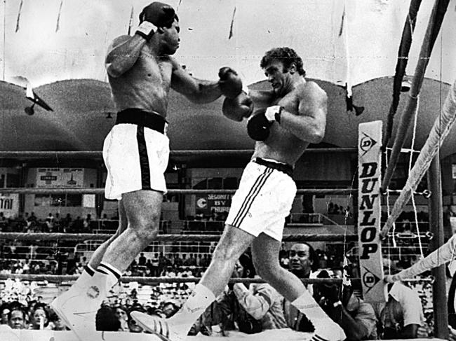 Bugner (right) in the ring with Muhammad Ali in Kuala Lumpur in 1975.