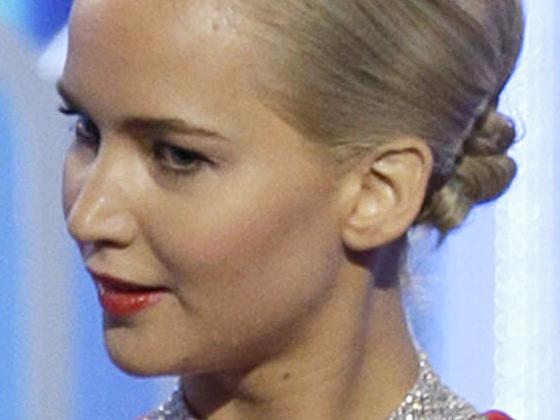 BEVERLY HILLS, CA - JANUARY 10: In this handout photo provided by NBCUniversal, Presenters Amy Schumer and Jennifer Lawrence speak onstage during the 73rd Annual Golden Globe Awards at The Beverly Hilton Hotel on January 10, 2016 in Beverly Hills, California. (Photo by Paul Drinkwater/NBCUniversal via Getty Images)