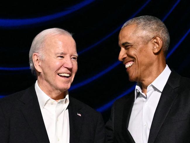 (FILES) US President Joe Biden (L) and former US President Barack Obama attend a campaign fundraiser at the Peacock Theater in Los Angeles on June 15, 2024. Former US president Barack Obama has told allies that Joe Biden needs to reconsider his reelection bid, the Washington Post reported on July 18, 2024. Obama believes that Biden's path to victory has diminished and that the 81-year-old should "seriously consider the viability of his candidacy," the newspaper said, citing people briefed on his thinking. (Photo by Mandel NGAN / AFP)