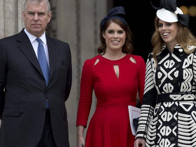 Britain's Prince Andrew (L), Britain's Princess Eugenie of York (2nd L), Britain's Princess Beatrice of York (R). Picture: AFP