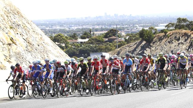 The peloton travels up the Southern Expressway with the city in background on its way from Glenelg to Victor Harbor. Picture: Sarah Reed