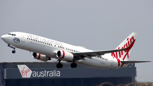 Virgin Australia plane departing from Brisbane Airport. Picture: David Clark.