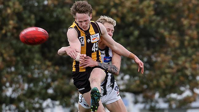 Will Golds is tackled by Jaidyn Stephenson in the VFL. Picture: Ian Currie