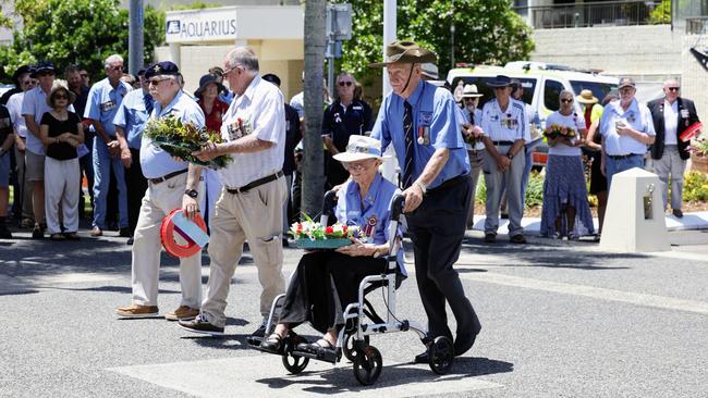 World War II veteran Val Veivers and former National Serviceman Neville O'Brien lay a wreath together. Picture: Brendan Radke