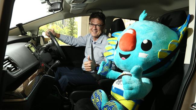 Southport MP Rob Molhoek and his giant Borobi in the passenger seat of his car when his electorate was riding high during the Games. Picture Glenn Hampson