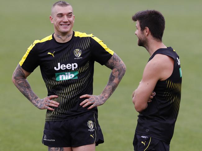 Dustin Martin chats with skipper Trent Cotchin during first day back at training. Pic: Michael Klein