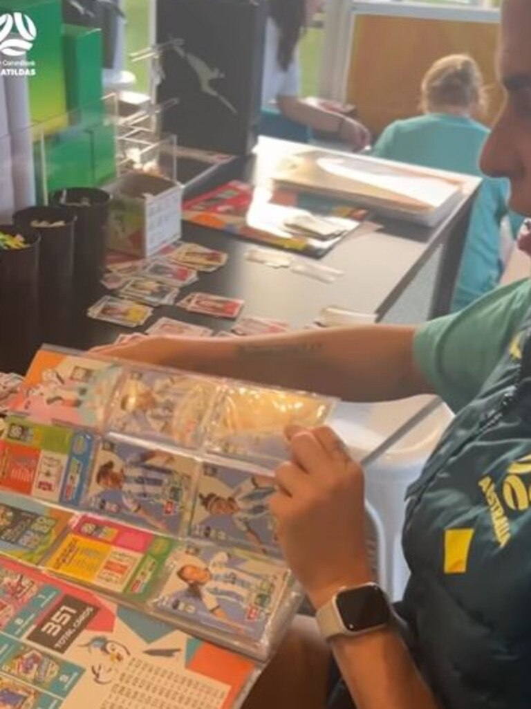 Lydia Williams shows off her collection of Panini stickers.