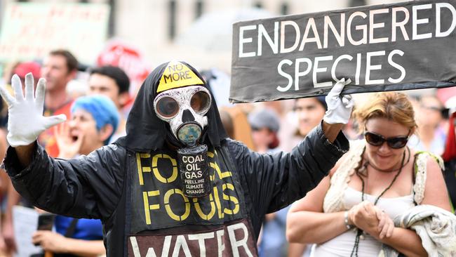 Protesters during a Stop Adani rally in Brisbane. Picture: AAP Image/Dave Hunt