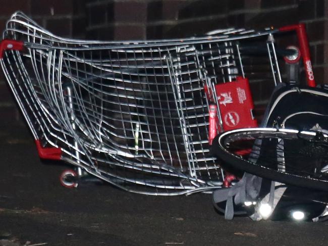 A male is deceased and a second male is critical after skylarking at Coogee Bay Road, Coogee. The males were riding a shopping trolley down the street when they were thrown out of the trolley when hit by a Hyundai Excell. The second male was taken to RPA Hospital. Police have established a crime scene and blocked the road. Pics Bill Hearne