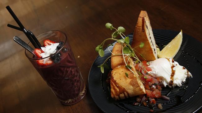 Food review at Tribeca, which has launched an all-new all-American morning menu. The Breakfast Bruschetta and Acai Smoothie. Picture: Jerad Williams