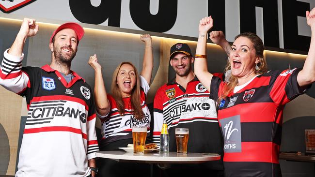 North Sydney Bears fans (L-R) Scott Cable, Victoria Bic, Ben Pickering and Rebecca Taylor, celebrating the announcement of the Perth Bears being the newest NRL team. Picture: Tim Hunter.