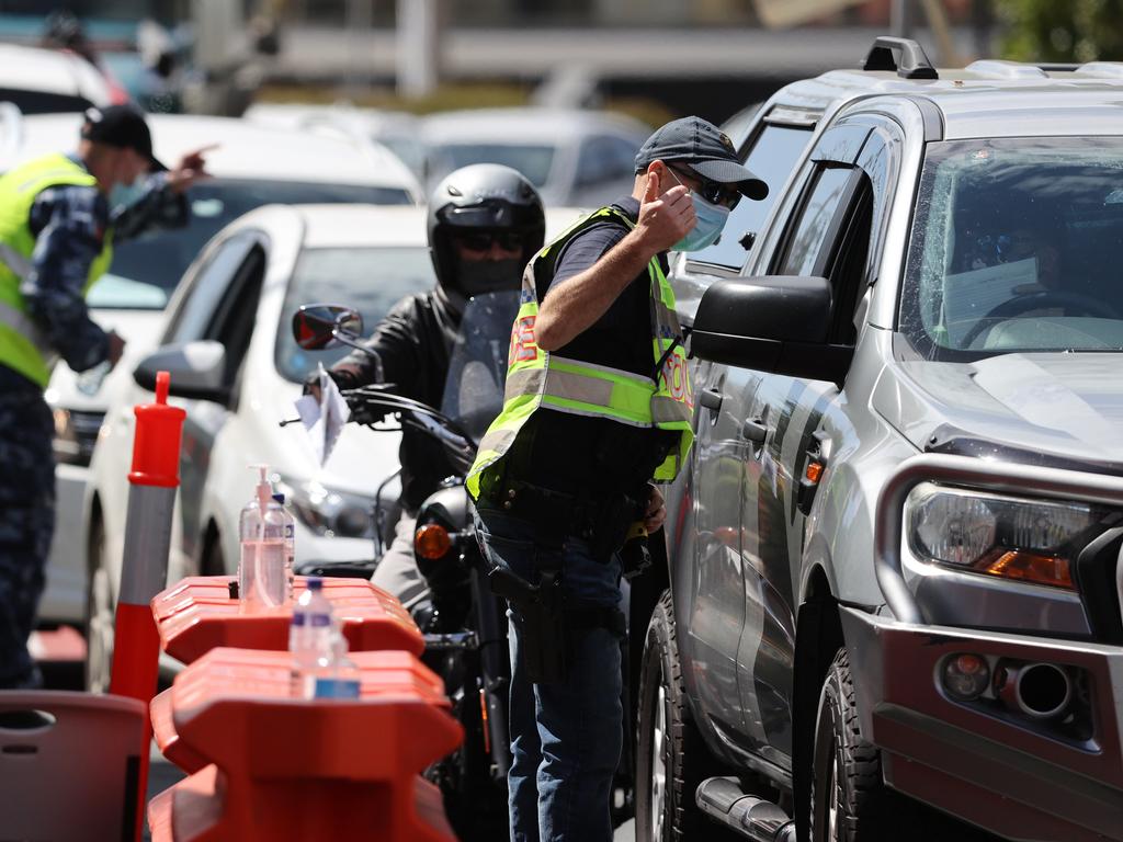 Police at the Queensland border on Griffith St, Coolangatta. Picture: Nigel Hallett